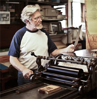 Alan Runfeldt, printer on the Vandercook Proof Press