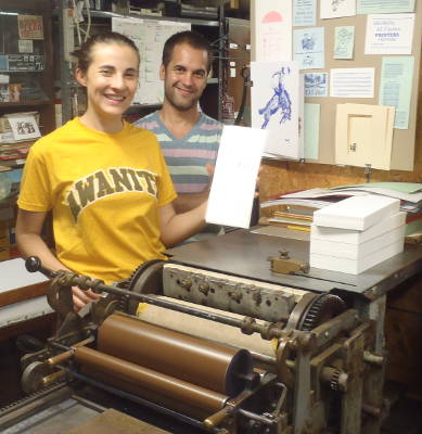 Antonia & Juan Printing on the
                    Vandercook