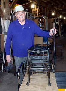 Bruce Olgilvey with his father's 6x9
                  Kelsey/Cook's Victor Printing Press
