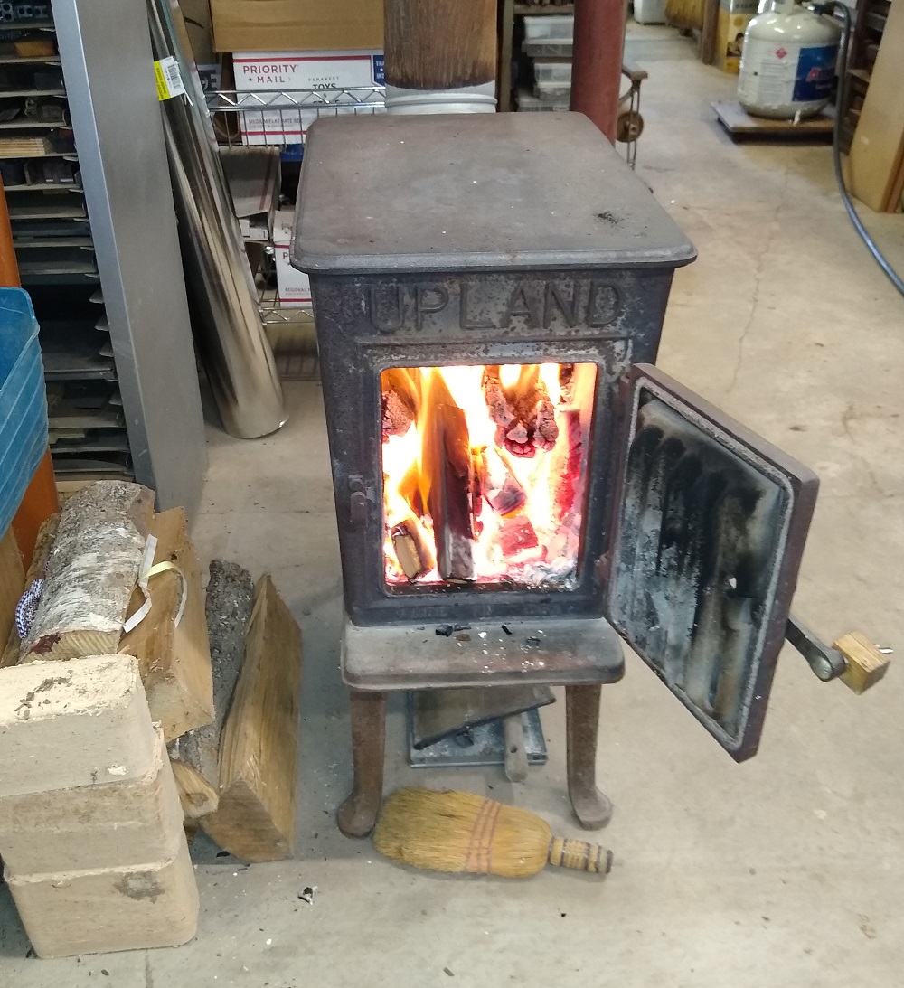 Wood
                            Stove, heating the shop nicely