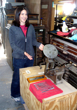Rachael and her press during
                            restoration