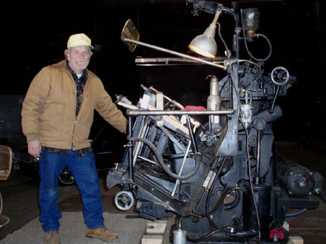 Alan Runfeldt of Excelsior Press with Heidelberg Windmill on set of "White Collar"